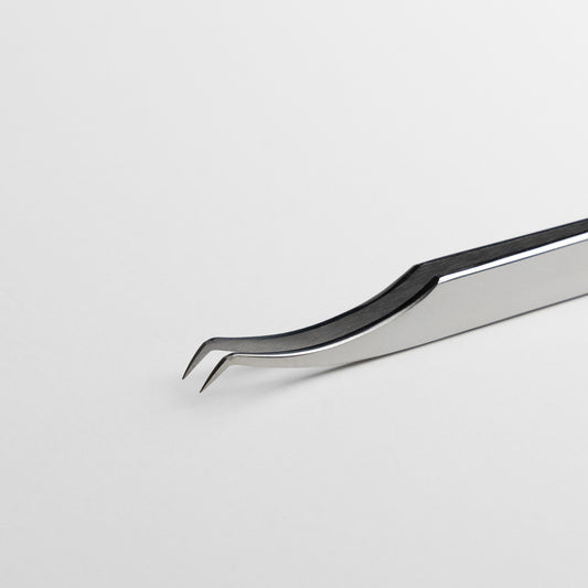 nahaufnahme pickup pinzette von flawless für beginner einzeltechnik in Wimpernverlängerung.